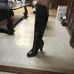 Tall brown leather boots